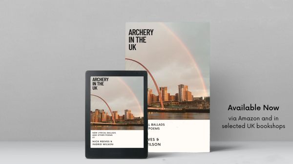 Book and tablet featuring rainbow and bridge arch