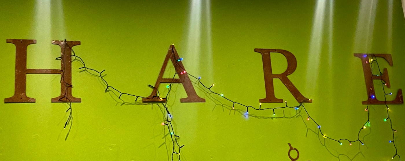 the word 'hare' in rust on a green background