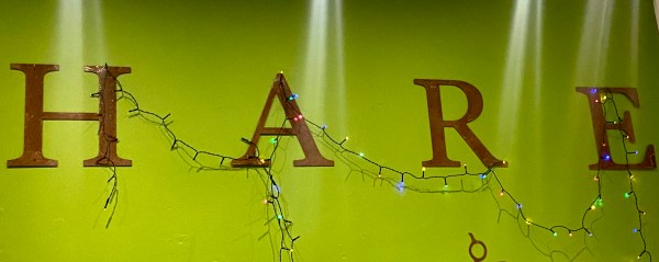 the word 'hare' in rust on a green background