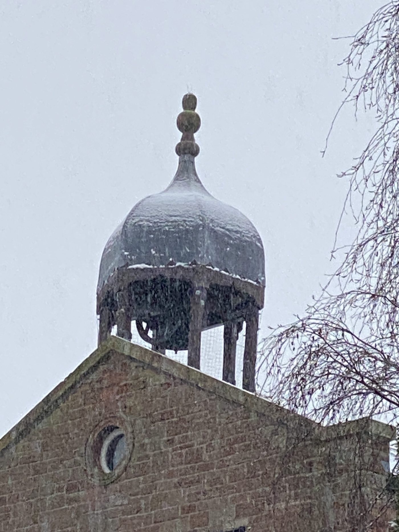 Bell tower with snow