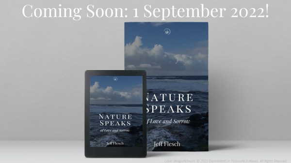 Book and tablet on neutral background